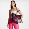 louis-vuitton-lv-x-yk-neverfull-mm-monogram-empreinte-leather-handbags-M46419_PM1_Worn_20view-scaled-1.jpg Louis Vuitton LV x YK Neverfull MM M46419 Noir Fuchsia