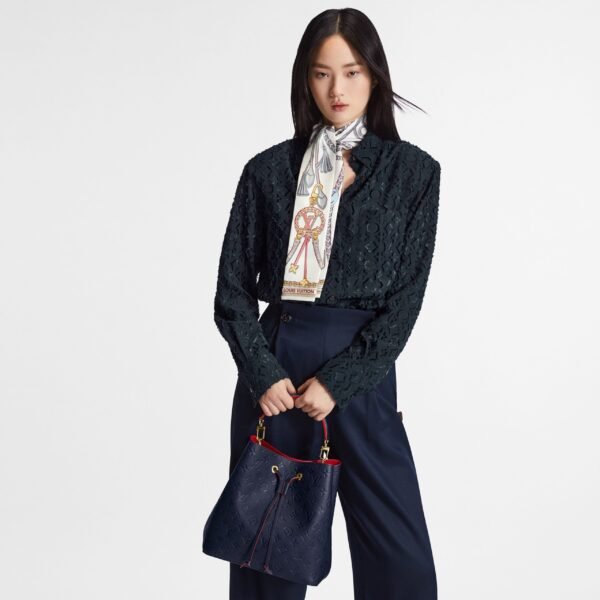 louis-vuitton-n_C3_A9ono_C3_A9-mm-monogram-empreinte-leather-handbags-M45306_PM1_Cropped_20worn_20view-scaled-1.jpg Louis Vuitton Néonoé MM Navy M45306