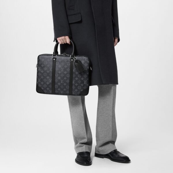 louis-vuitton-porte-documents-voyage-pm-monogram-eclipse-bags-M46457_PM1_Cropped_20worn_20view-scaled-1.jpg Louis Vuitton M46457 Porte-Documents Voyage PM Black